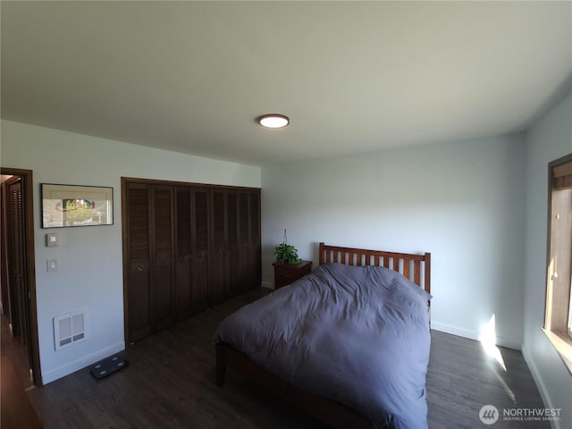 116 W 4th, Port Angeles, WA 98362 - bedroom featuring dark wood-style floors and baseboards