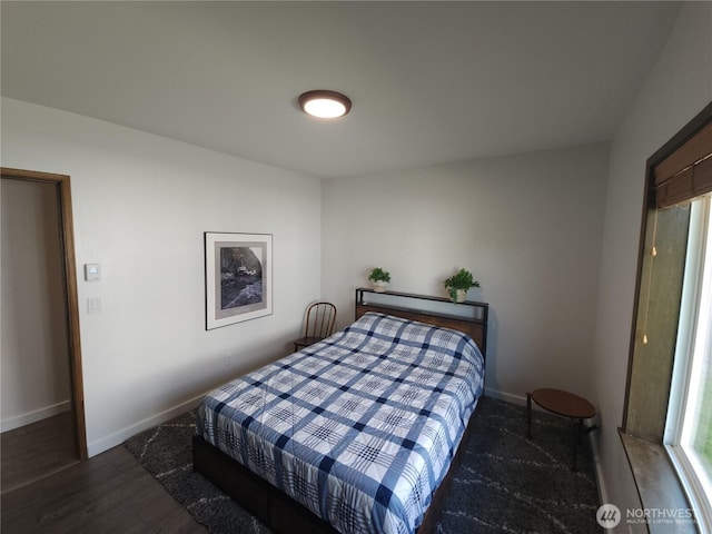 116 W 4th, Port Angeles, WA 98362 - bedroom with baseboards and wood finished floors