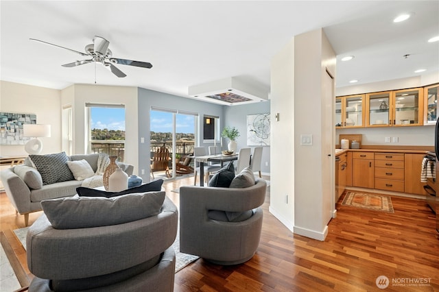 701 Galer St Unit 808, Seattle, WA 98109 - living area with light wood-type flooring, ceiling fan, recessed lighting, and baseboards