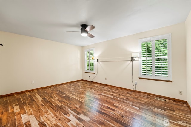 4528 SW 316th Pl, Federal Way, WA 98023 - unfurnished room featuring ceiling fan, wood finished floors, and baseboards