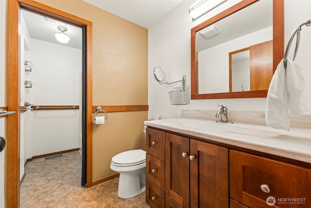 4528 SW 316th Pl, Federal Way, WA 98023 - bathroom with vanity, toilet, and baseboards