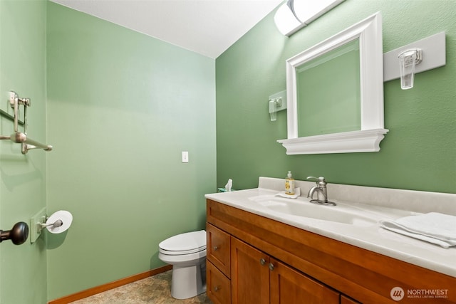 4528 SW 316th Pl, Federal Way, WA 98023 - bathroom with toilet, vanity, and baseboards