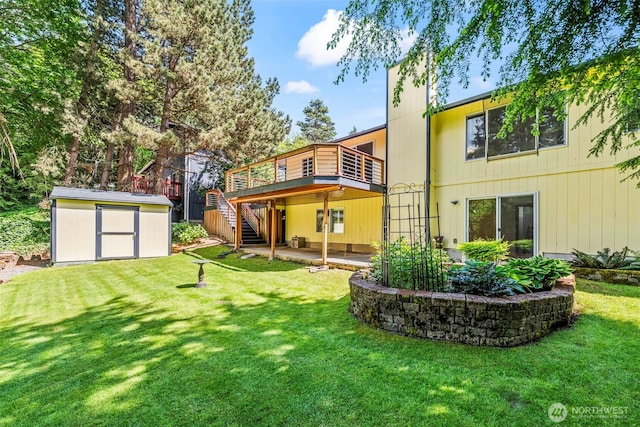 4528 SW 316th Pl, Federal Way, WA 98023 - back of property with stairs, a deck, and a yard