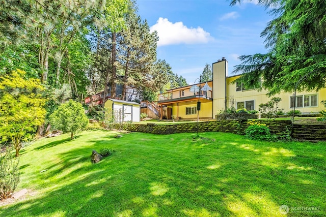 4528 SW 316th Pl, Federal Way, WA 98023 - view of green lawn with a wooden deck and stairs