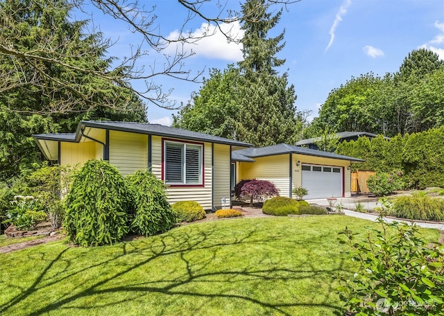 4528 SW 316th Pl, Federal Way, WA 98023 - view of front facade with a front yard, a garage, and concrete driveway