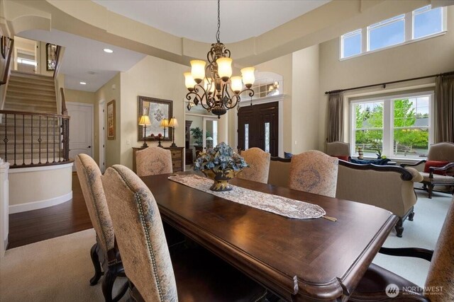 31045 219th Way SE, Black Diamond, WA 98010 - dining room with a chandelier, stairway, carpet floors, healthy amount of natural light, and recessed lighting