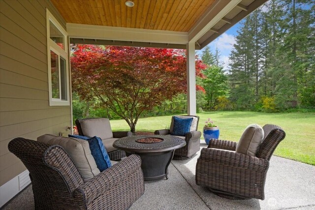 31045 219th Way SE, Black Diamond, WA 98010 - view of patio / terrace featuring an outdoor fire pit