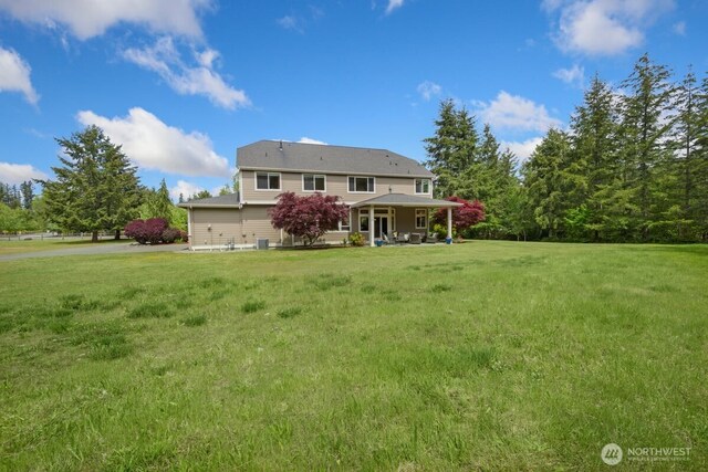 31045 219th Way SE, Black Diamond, WA 98010 - rear view of property with a lawn