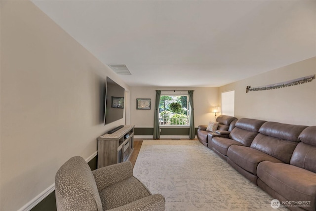 7611 176th Ave E, Bonney Lake, WA 98391 - living room featuring wood finished floors and baseboards