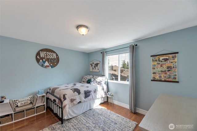 7611 176th Ave E, Bonney Lake, WA 98391 - bedroom featuring wood finished floors and baseboards