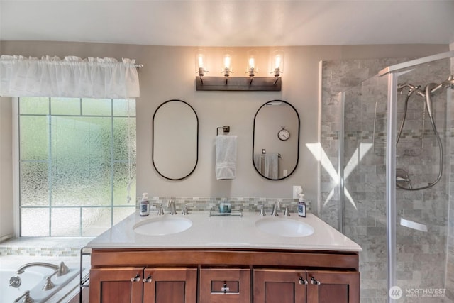 7611 176th Ave E, Bonney Lake, WA 98391 - full bath featuring double vanity, a stall shower, and a tub