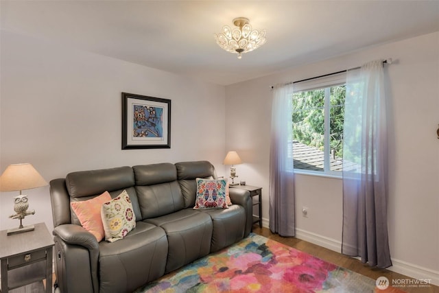 7611 176th Ave E, Bonney Lake, WA 98391 - living area featuring baseboards and wood finished floors