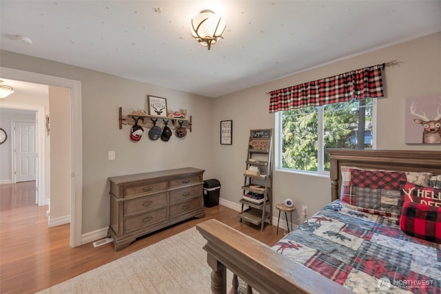 7611 176th Ave E, Bonney Lake, WA 98391 - bedroom with wood finished floors and baseboards