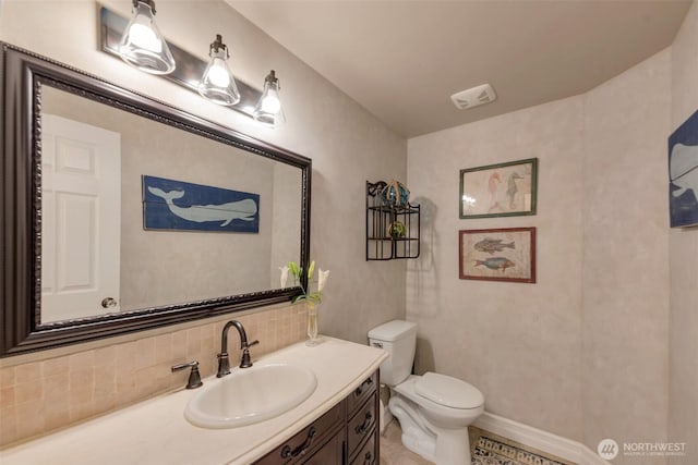 7611 176th Ave E, Bonney Lake, WA 98391 - half bath with decorative backsplash, toilet, and vanity