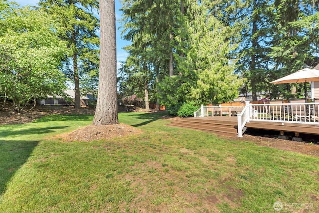 7611 176th Ave E, Bonney Lake, WA 98391 - view of green lawn featuring a deck