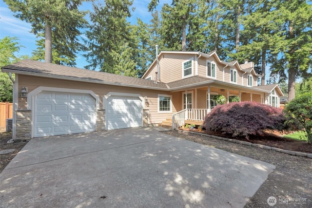 7611 176th Ave E, Bonney Lake, WA 98391 - view of front facade with an attached garage, concrete driveway, a porch, cooling unit, and a chimney