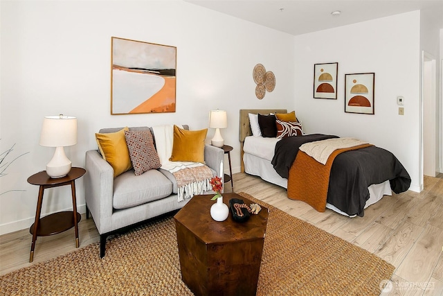 1414 12th Ave Unit 504, Seattle, WA 98122 - bedroom featuring light wood-type flooring and baseboards