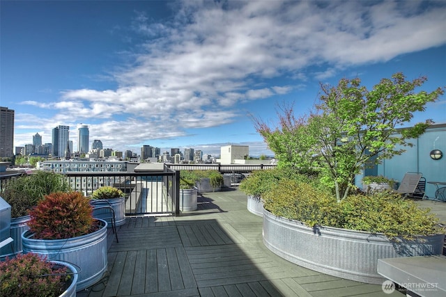 1414 12th Ave Unit 504, Seattle, WA 98122 - wooden deck with a skyline view