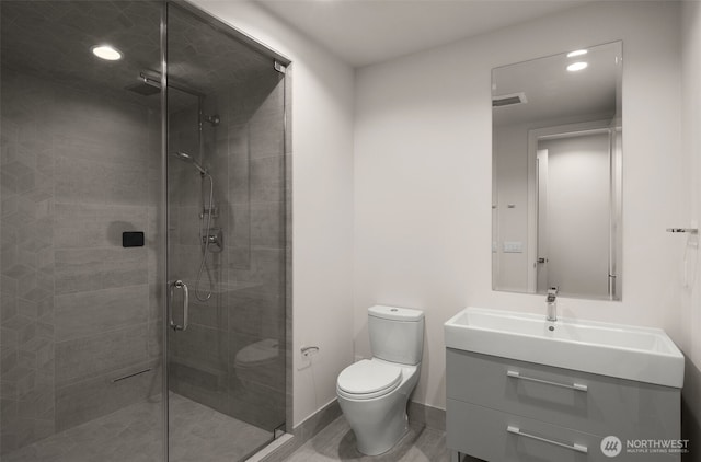 8926 NE 36th St, Yarrow Point, WA 98004 - full bathroom featuring toilet, a stall shower, vanity, baseboards, and recessed lighting