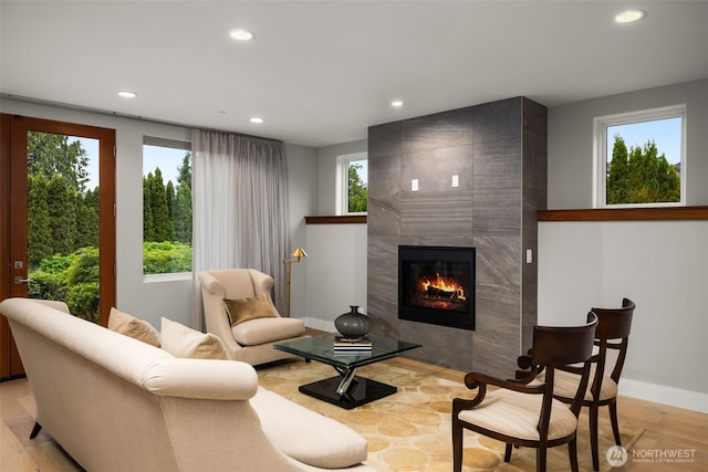 8926 NE 36th St, Yarrow Point, WA 98004 - living area featuring recessed lighting, a tiled fireplace, and baseboards