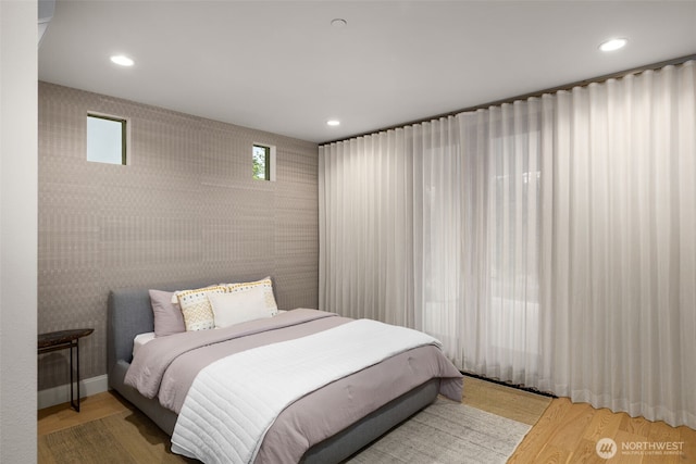 8926 NE 36th St, Yarrow Point, WA 98004 - bedroom with wood finished floors and recessed lighting