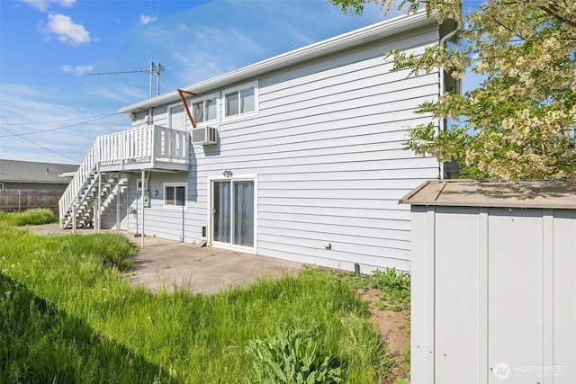47 SE 10th St, College Place, WA 99324 - back of house with stairs, a deck, cooling unit, and a patio area