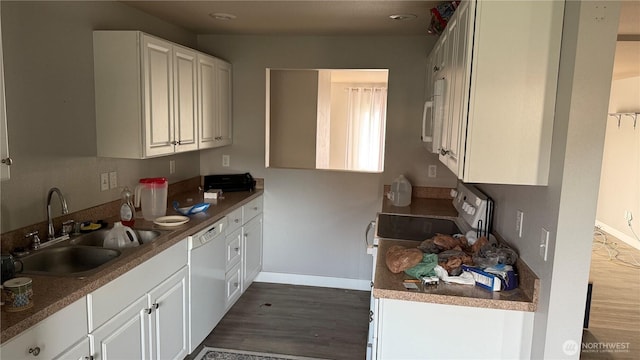 47 SE 10th St, College Place, WA 99324 - kitchen with a sink, white appliances, dark wood-style flooring, and baseboards