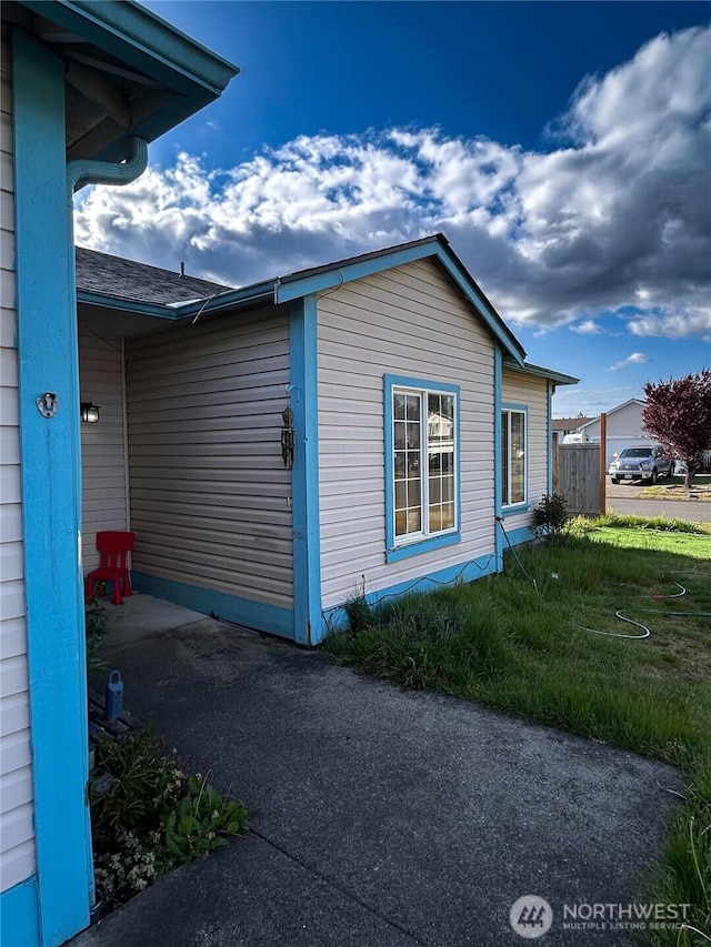 19904 13th Avenue Ct E, Spanaway, WA 98387 - view of home's exterior featuring a yard