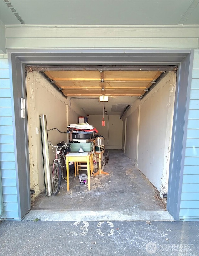 garage featuring a garage door opener