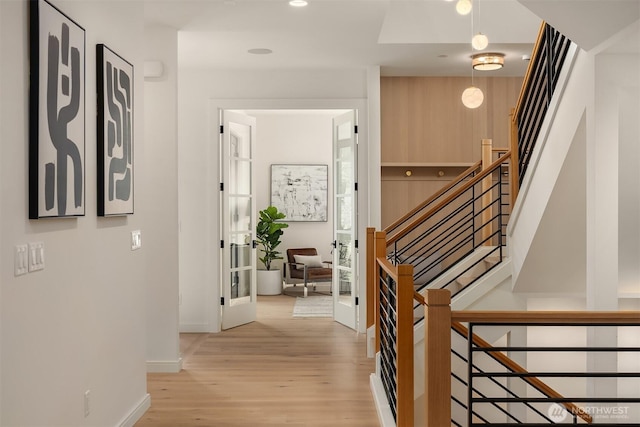 11320 113th Pl NE, Kirkland, WA 98033 - hallway featuring baseboards, light wood-style flooring, stairway, and recessed lighting