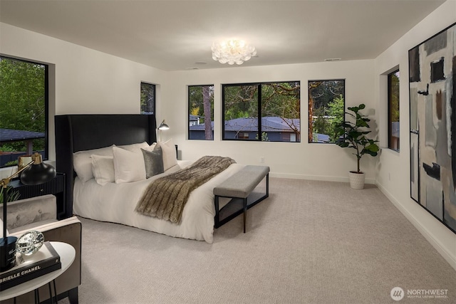 11320 113th Pl NE, Kirkland, WA 98033 - bedroom with carpet, a chandelier, and baseboards