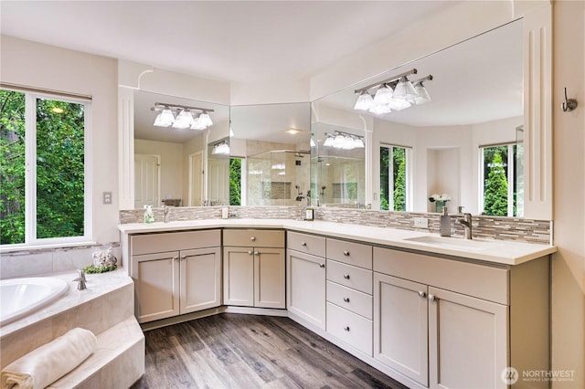 20524 73rd Dr SE, Snohomish, WA 98296 - full bath featuring a shower stall, double vanity, a bath, and wood finished floors
