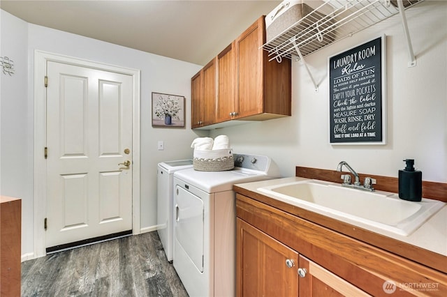 20524 73rd Dr SE, Snohomish, WA 98296 - washroom with washer and dryer, dark wood finished floors, cabinet space, and baseboards