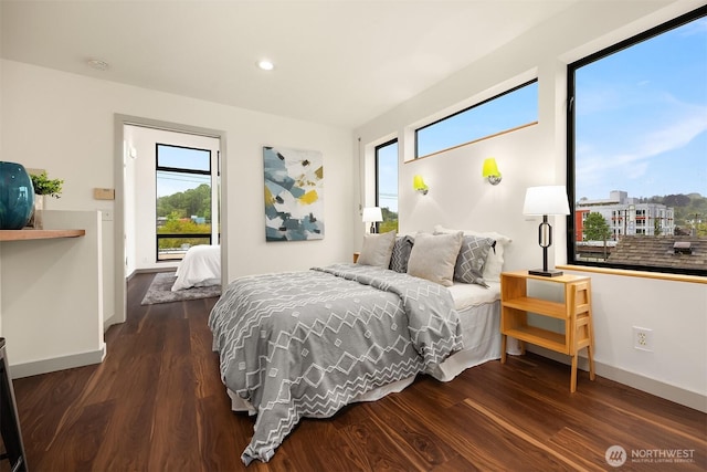 3818 S Hudson St Unit A, Seattle, WA 98118 - bedroom with wood finished floors, baseboards, and recessed lighting