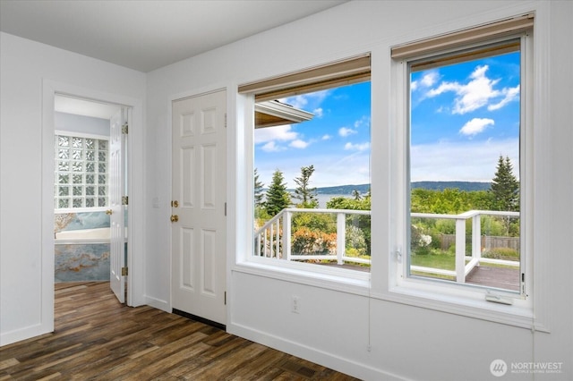 366 Samanthia Ln, Camano Island, WA 98282 - unfurnished room featuring dark wood finished floors and a water view