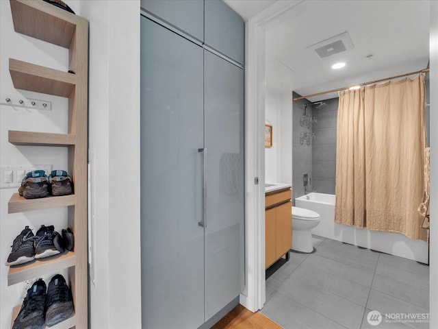 1808 Minor Ave Unit 501, Seattle, WA 98101 - bathroom with vanity, shower / bathtub combination with curtain, tile patterned floors, and toilet