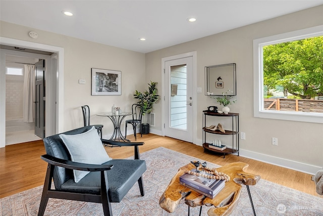 9419 39th Ave S, Seattle, WA 98118 - sitting room with baseboards, light wood finished floors, and recessed lighting