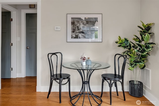 9419 39th Ave S, Seattle, WA 98118 - dining room with wood finished floors and baseboards