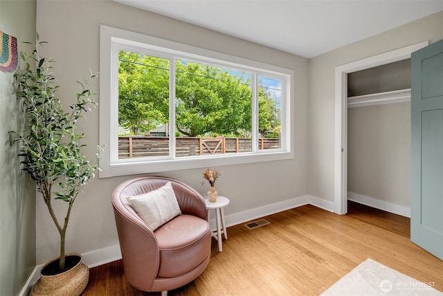 9419 39th Ave S, Seattle, WA 98118 - sitting room with light wood finished floors and baseboards