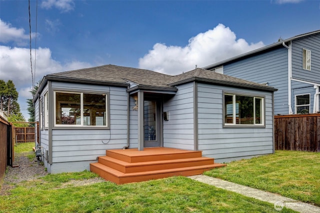 9419 39th Ave S, Seattle, WA 98118 - back of property with a shingled roof