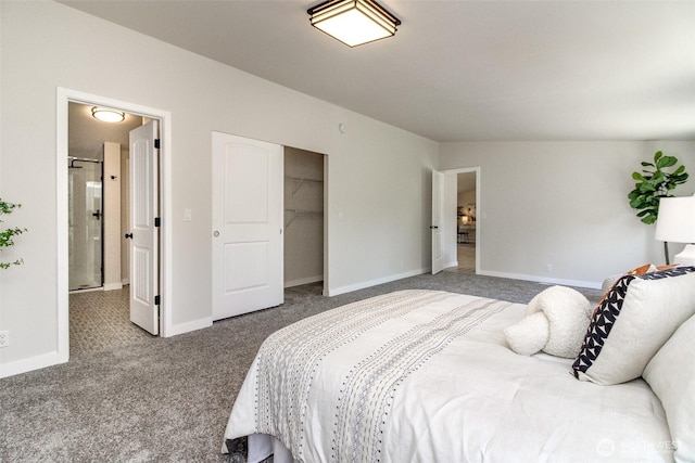 carpeted bedroom featuring baseboards and a closet