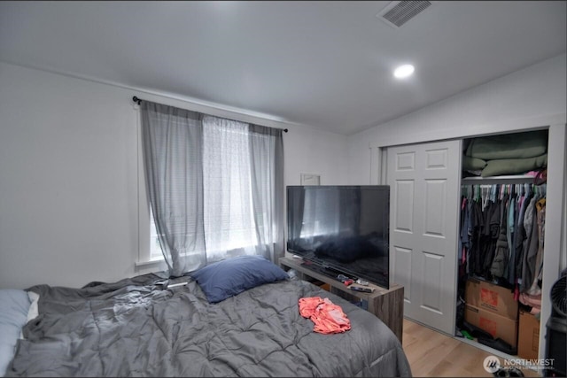 44094411 21st Ct SE, Lacey, WA 98503 - bedroom featuring vaulted ceiling, light wood-type flooring, and a closet