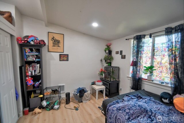 44094411 21st Ct SE, Lacey, WA 98503 - bedroom with wood finished floors, recessed lighting, and vaulted ceiling