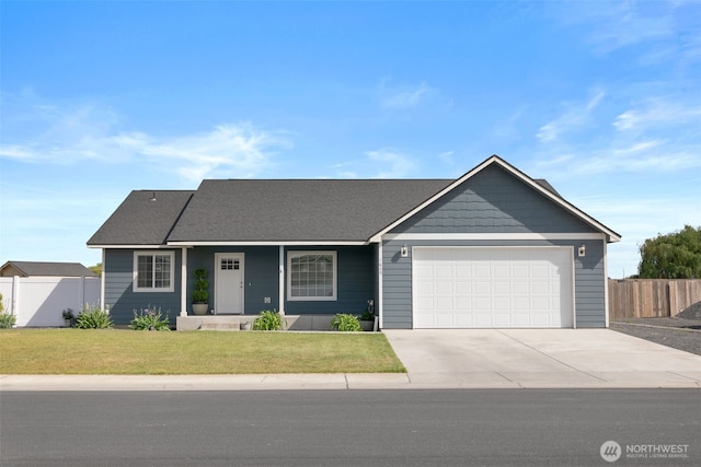 1620 2nd Ave SW, Quincy, WA 98848 - view of front of home featuring an attached garage and concrete driveway