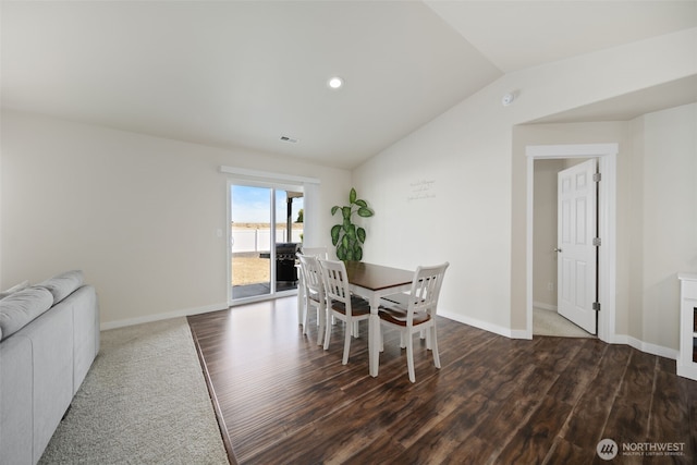 1620 2nd Ave SW, Quincy, WA 98848 - dining area with vaulted ceiling, wood finished floors, and baseboards