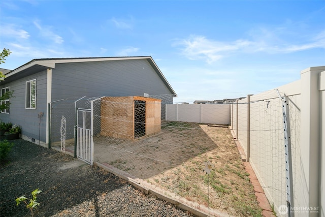 1620 2nd Ave SW, Quincy, WA 98848 - rear view of house with a fenced backyard and a gate