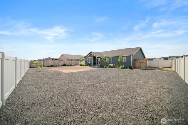 1620 2nd Ave SW, Quincy, WA 98848 - back of house with a fenced backyard and a residential view