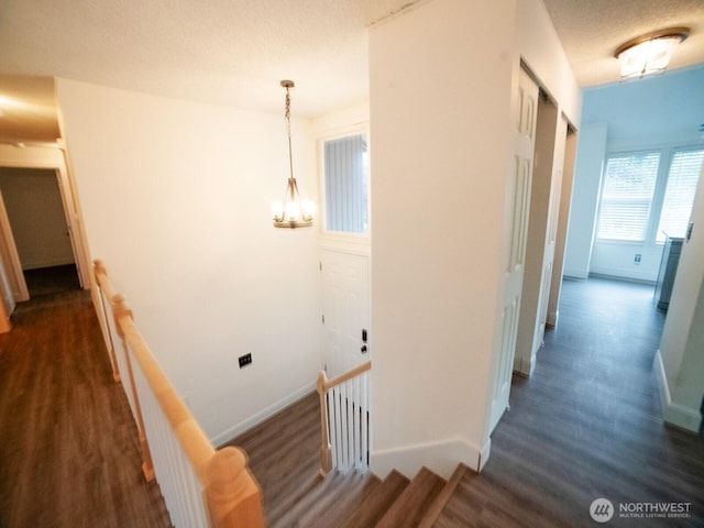 2840 SW 342nd St, Federal Way, WA 98023 - hall with an upstairs landing, dark wood-type flooring, and a chandelier