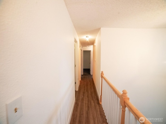 2840 SW 342nd St, Federal Way, WA 98023 - hall with wood finished floors, an upstairs landing, and a textured ceiling