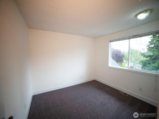 2840 SW 342nd St, Federal Way, WA 98023 - unfurnished room with dark carpet and baseboards